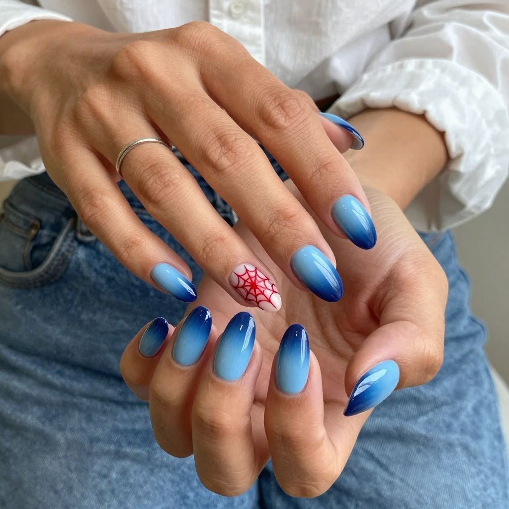 Blue Ombre With Red Web Accent Nails