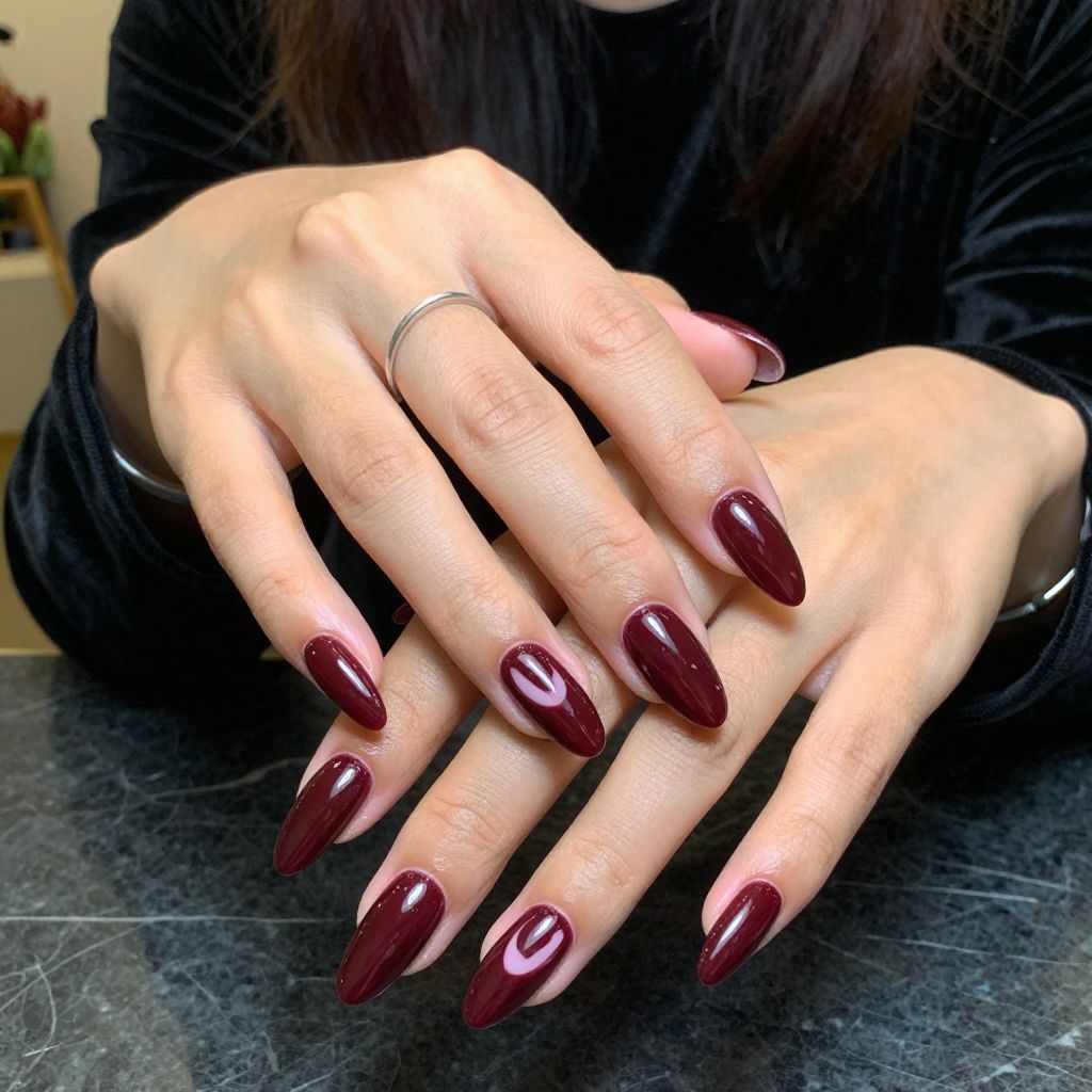 Deep Burgundy Gloss Almonds with Negative Space Cutouts